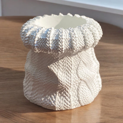 Knitted Glow — Cozy Textured Candle Pot